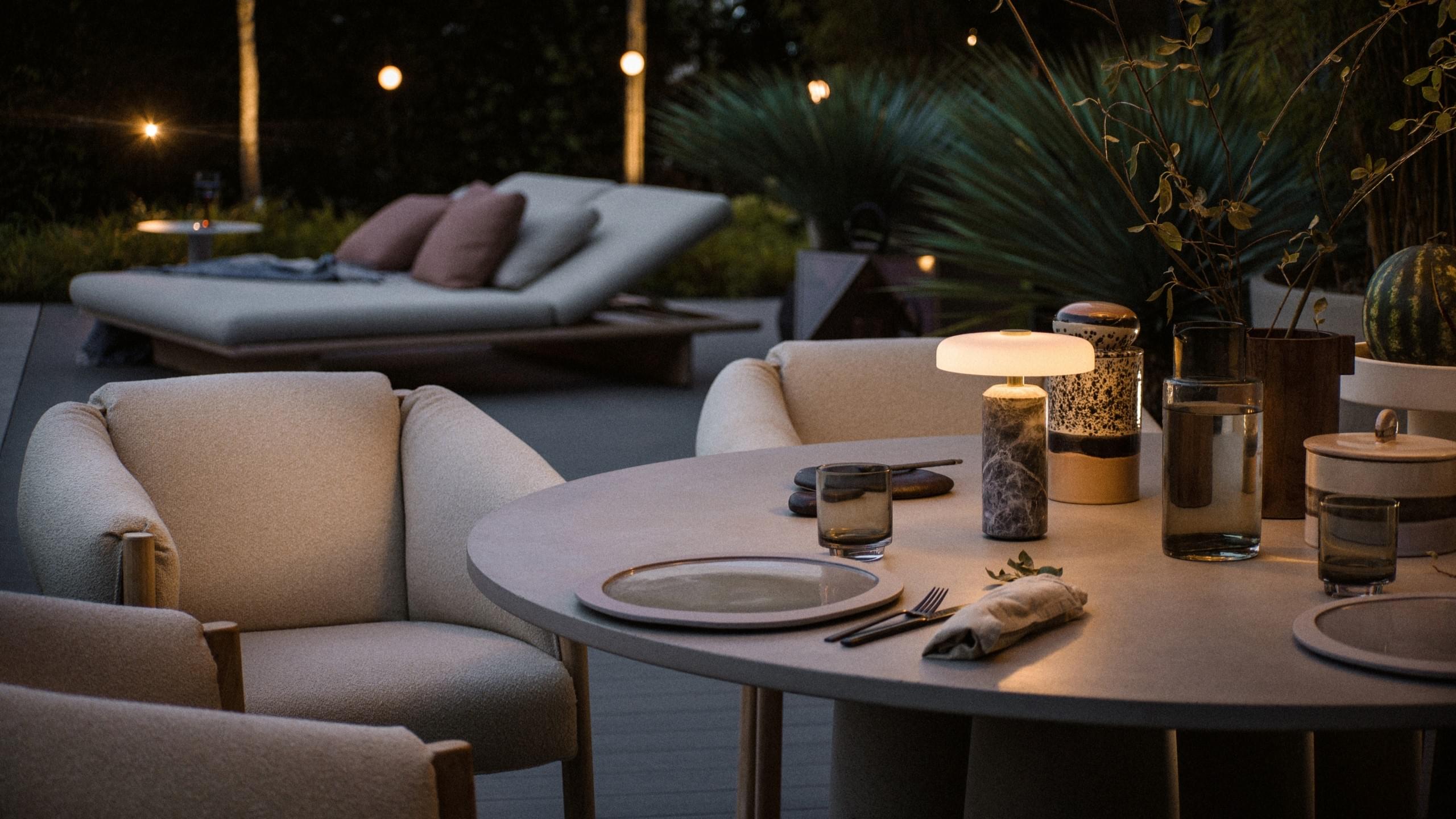 Table with tableware in the garden